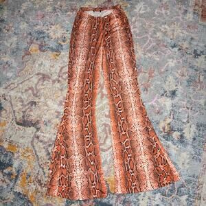 Black and orange snakeskin print high-waisted flared leggings / pants